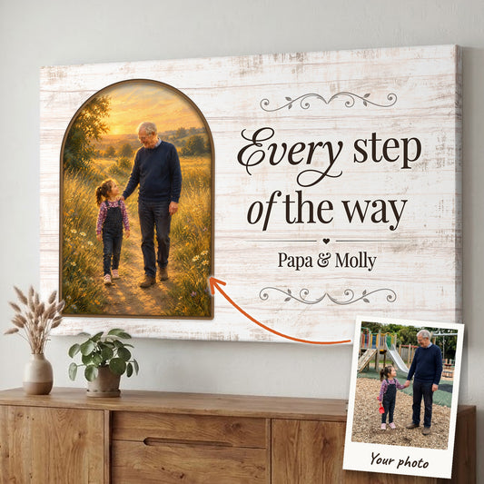 Custom canvas made from a family photo: a playground snapshot of a grandfather and his granddaughter painted as a warm oil-style portrait of them walking a golden meadow path, with Every step of the way and the names Papa & Molly
