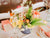 peach-colored flower centerpiece - Easter 2024 - Spring decor ideas - GearDen