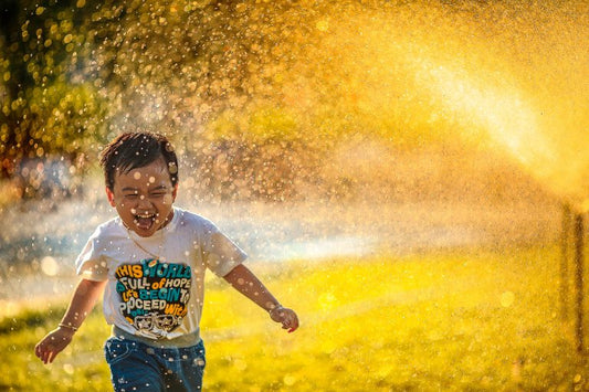 child playing outside - ideas for kids to play off screens
