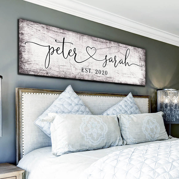 bedroom with custom wall art with couple names - GearDen