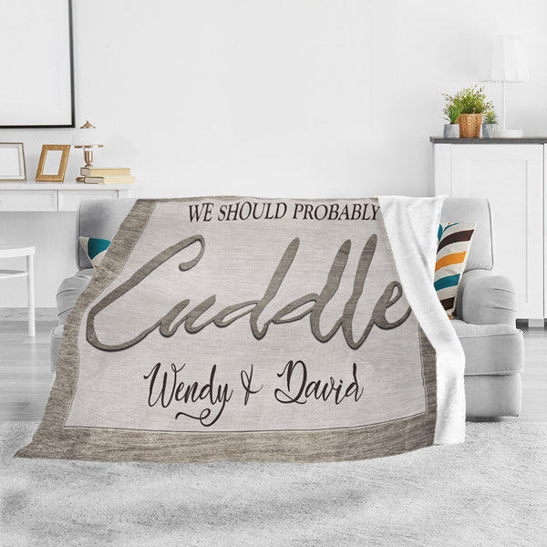 light gray living room with throw blanket that says "we should probably cuddle" - Gear Den