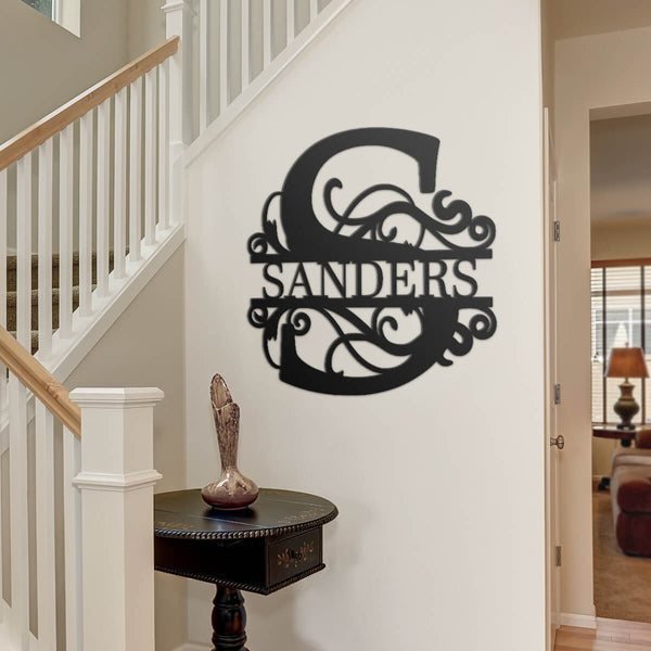 stairs and hallway with custom metal monogram art with family name - Gear Den
