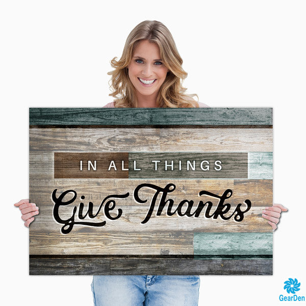 "IN ALL THINGS GIVE THANKS" lady holding wall art quote