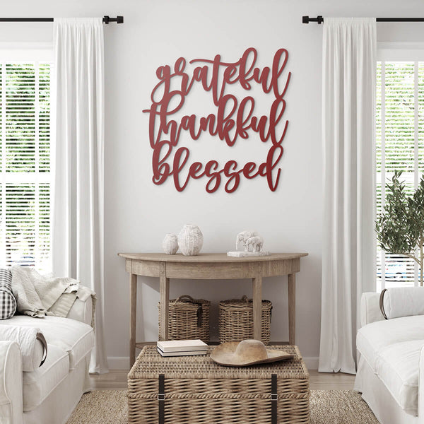 living room with red metal art that says grateful, thankful, blessed - GearDen